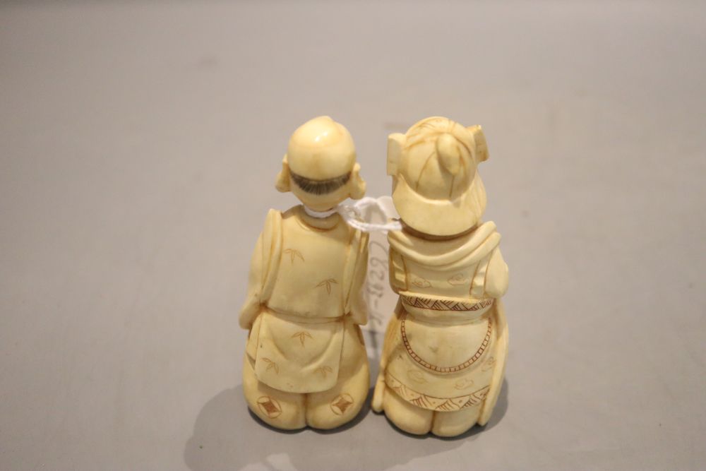 Two walrus ivory figures